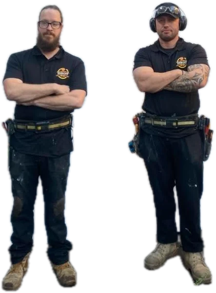 The NewLife Handyman team in black work shirts and tool belts